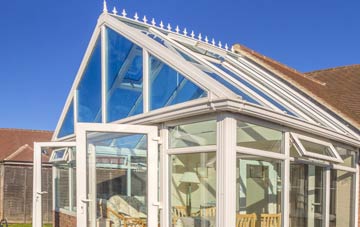 conservatory roof insulation costs Caermeini